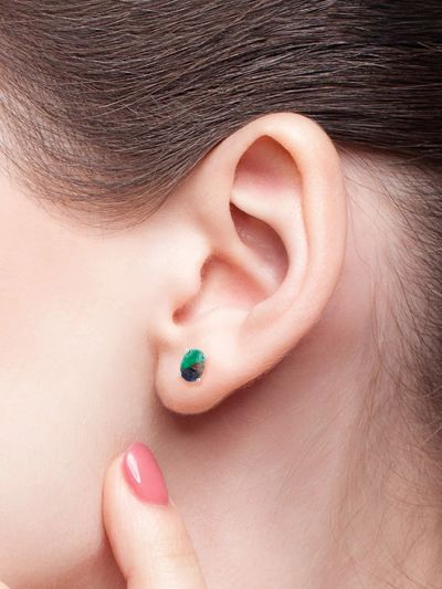 925 sterling silver white rhodium plated 7x5 mm designer stud earrings